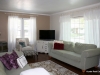 Living room with crown molding and hardwood floors