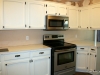 Ktichen with stainless appliances and refinished cabinets